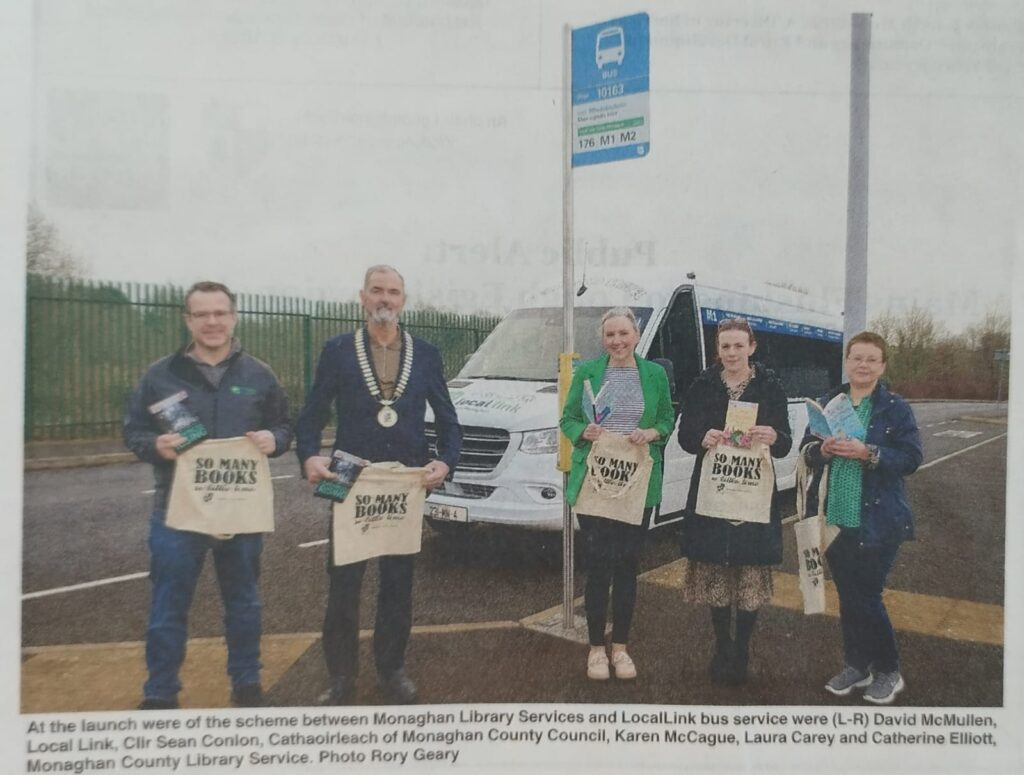 Photo of Library Staff and Local Link staff holding books that were placed on Buses for Ireland Reads Day 2023