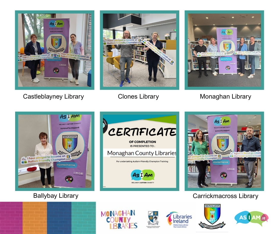 Photo of library staff holding banners pledging to become more Autism friendly.