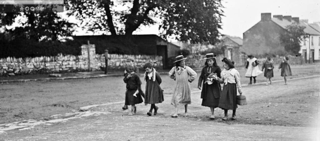 Fig 3. Children walking up York Street past the Clarke house sometime in the early 1900s.