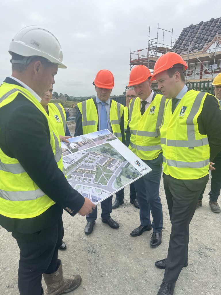 Management Team photo with Junior Housing Minister 