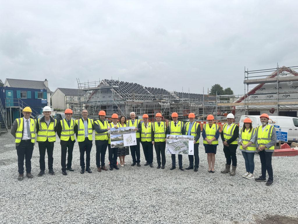 Management Team photo with Junior Housing Minister 