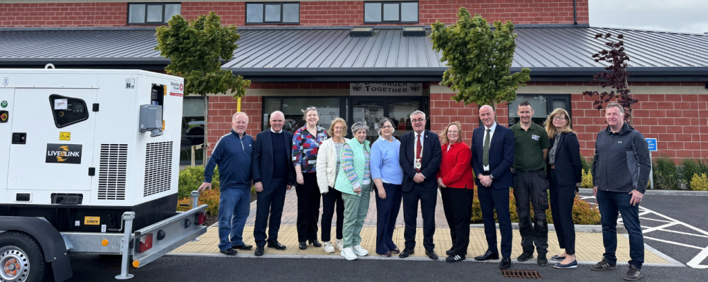 Demonstration taking place at Magheracloone Community Centre of a newly installed generator changeover switch in operation.